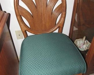 There are 10 of these rattan chairs. They can be divided into sets or pairs