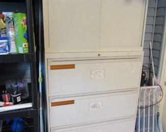 2 different metal cabinets