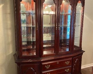 Cherry wood lighted china cabinet. In great shape! 