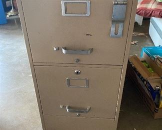2- drawer filing cabinet. Has external lock 