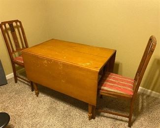 Old drop-leaf table. Needs refinishing