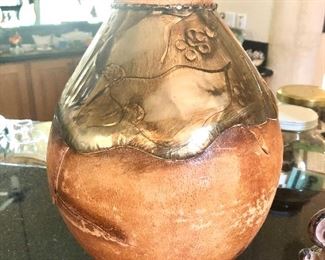 Leather covered vase