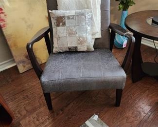 #GR7 - Buy It Now - $150.00
Contemporary club chair in grey bonded leather 30 1/2" H x 27" W x 26" D - Local Pickup Only