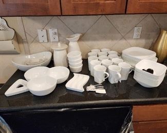 White serving dishes on left are still available The white Corelle square dishes and mugs on right have SOLD