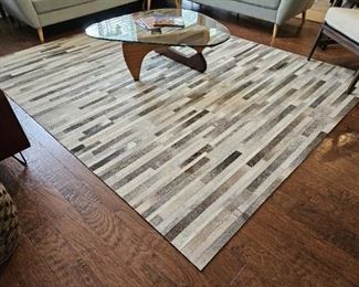 #GR2 - Buy It Now - $750.00
Animal hide area rug 95" W x 118" L - Local Pickup Only