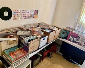 The room holds hundreds of Albums of all genre. TV's