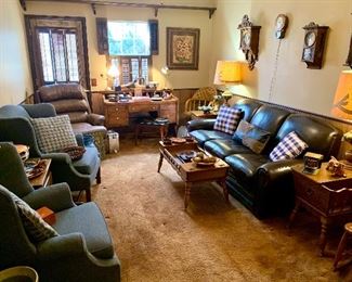 Leather couch, Leather recliner, Blue winged backed chairs, Ethan Allen Early American Maplewood Coffee table, Ethan Allen Early American Maplewood Dough box with magazine storage. Vintage wood desk. Antique lamp, Deco lamps.