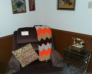 Recliner, vintage crosstitch wall art, vintage afghan, and more.