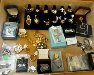 Vintage jewelry including Avon and sterling silver pieces