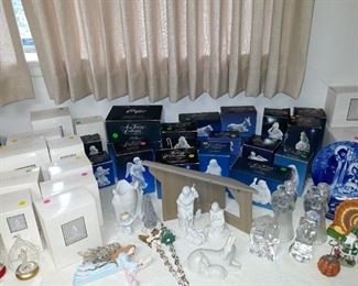 Four different Avon Nativity sets