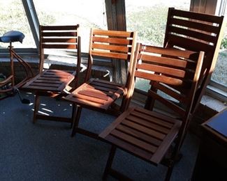 Beautiful wood folding chairs set of four.