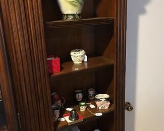 Another bookshelf, mugs, vase