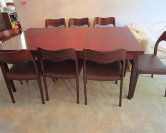 MID CENTURY MODERN JL Moller Denmark Rosewood dining table that expands with 8 chairs, absolutely pristine.