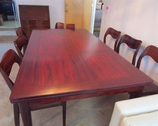 MID CENTURY MODERN JL Moller Denmark Rosewood dining table that expands with 8 chairs, absolutely pristine.