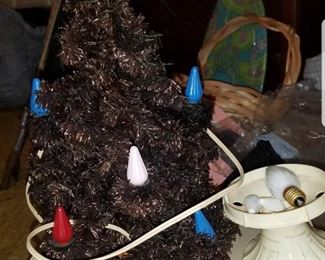 Vtg shiny brown mini Christmas tree and stand (shedding badly)