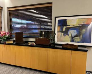 Cabinet with granite top, vintage surveying equipment, modern art