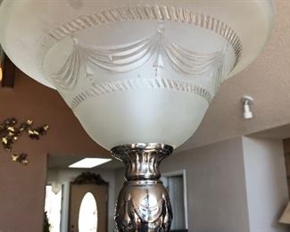 The globe and intricate design.