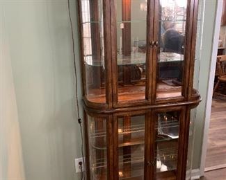 #14	Display Cabinet w/curved sides & Curved Glass w/4 glass shelves & 4 doors 33x11x73  w/dual Lighting in top & Bottom	 $175.00 
