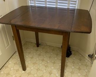 #29	Wood Drop Side Table - 30-48x30x36 w/Two 24" Seat Height Chairs	 $150.00 
