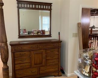 #40	Keller Tall Dresser w/Mirror w/8 drawers & 1 door - 56x19.5x42T  Mirror is Beveled w/wood Trim - 41.5x42 - You move downstairs	 $425.00 

