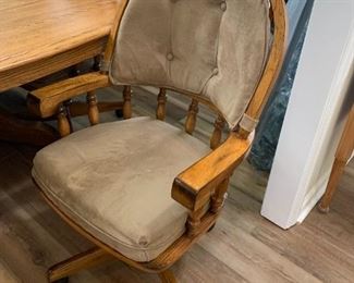 #59	Oak Rectangular Table w/2 leaves & 8 Heavy Wooden Chairs that slightly recline on Wheels w/Tan Padded seats & Back w/arms (arms on All Chairs) w/double pedistal Feet  70-103x48x29	 $375.00 
