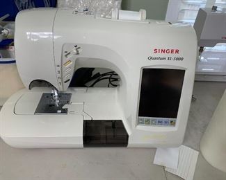 #61	Singer Quantum XL-5000 Sewing and Embroidery Machine w/Hoops Attachments, Manuals & Two Rolling Bags - complete lot sold together 	 $475.00 
