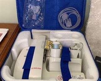 #61	Singer Quantum XL-5000 Sewing and Embroidery Machine w/Hoops Attachments, Manuals & Two Rolling Bags - complete lot sold together 	 $475.00 
