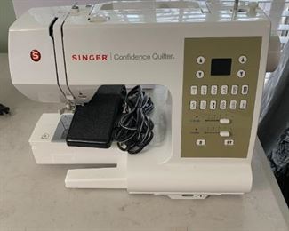 #62	Singer Confidence Quilter 	 $100.00 
