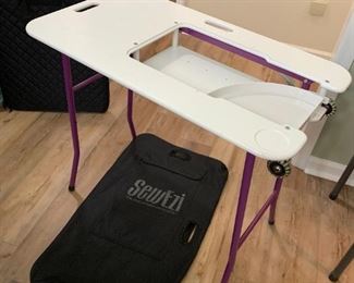 #64	SewEzi Table w/Bag  (needs a plexi-glass Center for your machine)	 $175.00 
