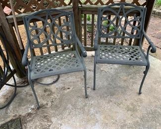 #102	pair of Heavy Metal Side Patio Chairs 	 $75.00 
