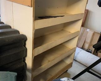 #140	2 Sided White Painted rolling Shelf w/4 shelves on either side - 38x26x53	 $100.00 
