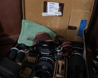 #163	Vtg. Nikon Camera w/lens & lot	 $120.00 
