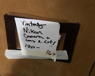 #163	Vtg. Nikon Camera w/lens & lot	 $120.00 
