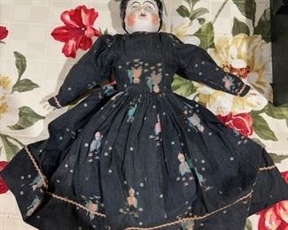 Old china doll, there are several other old dolls