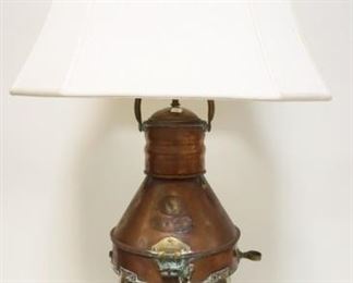 	LARGE BRASS & COPPER NAUTICAL MARITIME SHIPS LANTERN W/TAGS STAMPED *ANCHOR E BAKER & CO MAKERS*, HAS BEEN ELECTRIFIED, HAS LENS CHIPS, APPROXIMATELY 41 IN HIGH OVERALL
