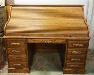 	CONTEMPORARY SOLID OAK ROLL TOP DESK W/CHAIR, DAMAGE TO CANING ON CHAIR SEAT, DESK TAMBOR STICKS, APPROXIMATELY 60 IN X 33 IN X 51 IN HIGH
