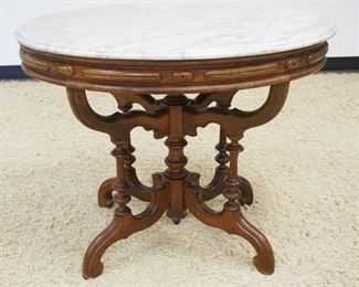 	VICTORIAN OVAL MARBLE TOP TABLE, APPROXIMATELY 26 IN X 36 IN X 29 IN HIGH
