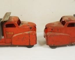 	LOT OF 2 ANTIQUE PRESS STEEL DUMP TRUCKS, APPROXIMATELY 9 IN X 23 IN X 8 IN HIGH
