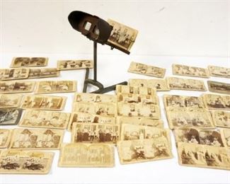 1129	ANTIQUE TABLE TOP STEREOVIEWER W/MANY ASSORTED CARDS
