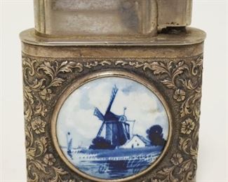 1139	LARGE SILVERPLATE LIGHTER W/DELFT INSET MEDALIONS, APPROXIMATELY 4 IN HIGH
