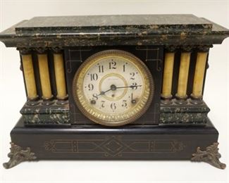 1149	SETH THOMAS VICTORIAN MANTLE CLOCK IN EBONIZED & FAUX MARBLE WOOD CASE W/METAL MOUNTS & GARNITURES, APPROXIMATELY 18 IN X 7 IN X 11 1/4 IN HIGH
