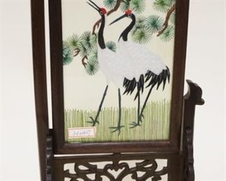1182	MINIATURE ASIAN SILK SCREEN IN GLASS ROTATING FRAME W/FRETWORK WOOD STAND, APPROXIMATELY 14 IN HIGH
