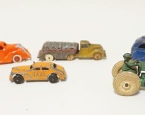 1254	GROUP OF ASSORTED ANTIQUE CAST METAL TOYS, LARGEST APPROXIMATELY 7 IN X 2 IN HIGH
