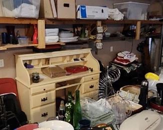 Many garage items including a desk