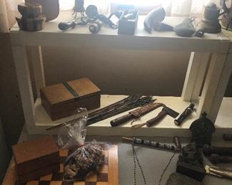 Checkerboard, arrows, carvings