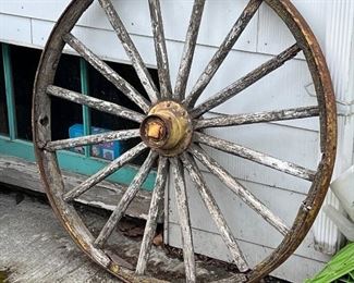 Old wagon wheel to your garden
