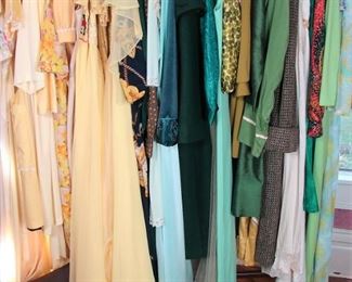 rack of yellow and green vintage clothing