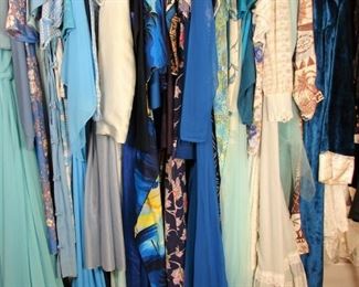 rack of blue vintage clothes