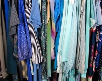 rack of blue vintage clothing