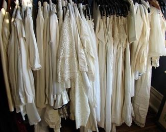 rack of white vintage clothes